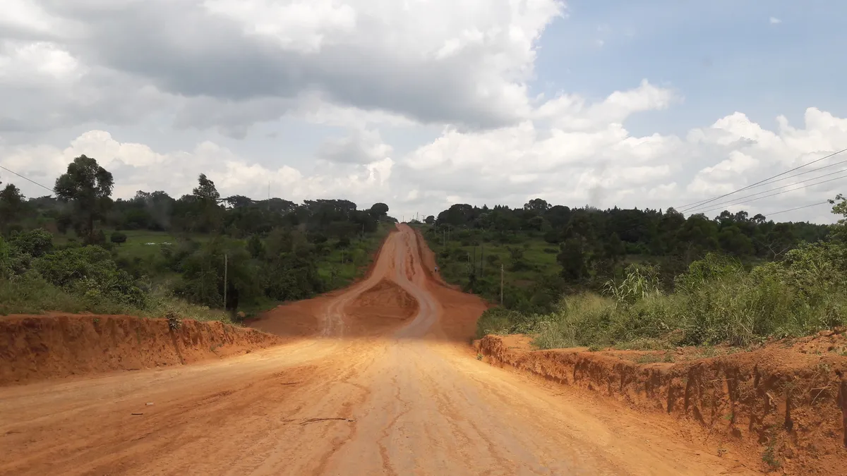 Remote unpaved access road surveyed for logistics feasibility